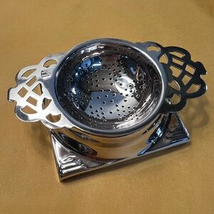 Vintage English Art Deco silver-plated tea strainer with drip tray